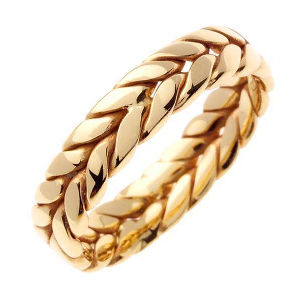 Символ переплетения судеб – обручальные кольца с косичкой из золота. обручальные кольца